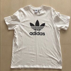NWOT Adidas White Men's T-Shirt size XL. Never worn no tags attached.